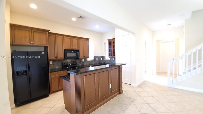 Foto del edificio - 6033 NW 118th Dr