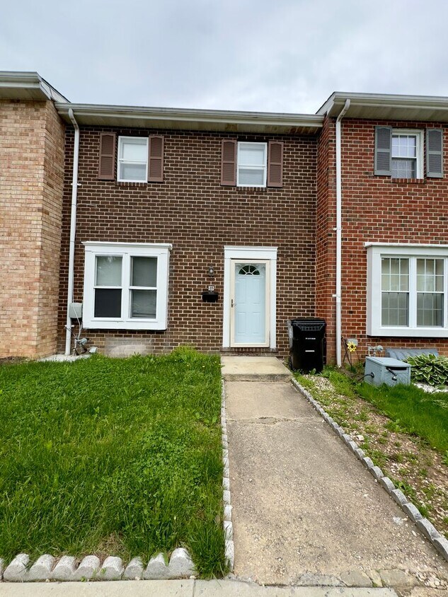 Primary Photo - Modern 3-Bedroom Townhome with Spacious Ya...