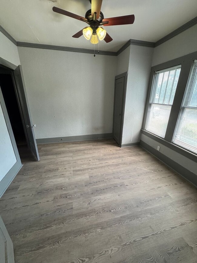 Building Photo - Three bedroom two bath home with central heat and air, large fenced backyard, and carport!