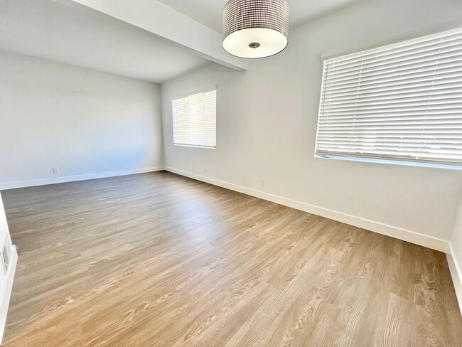 Building Photo - Modern 2 Bedroom Peninsula Gem Steps from the Shore