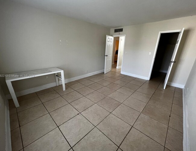 Building Photo - UNIT FOR RENT AT DORAL GARDENS II at $1900