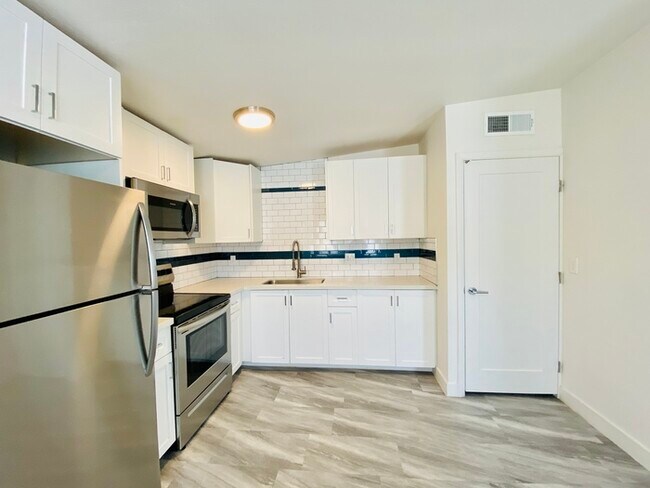 Building Photo - Modern living in this completely remodeled...