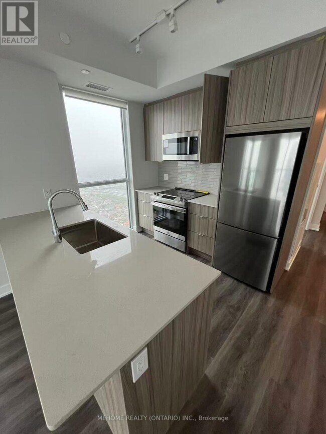 Photo du bâtiment - 430-4430 Square One Dr
