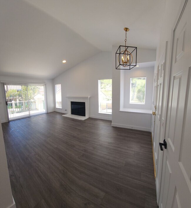 Building Photo - Gorgeous 2 bedroom newly renovated upstairs corner condo in gated community with pool & hill side...