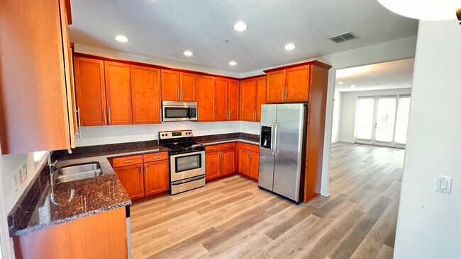 Building Photo - Welcome to Your Three-Story Paradise in Th...