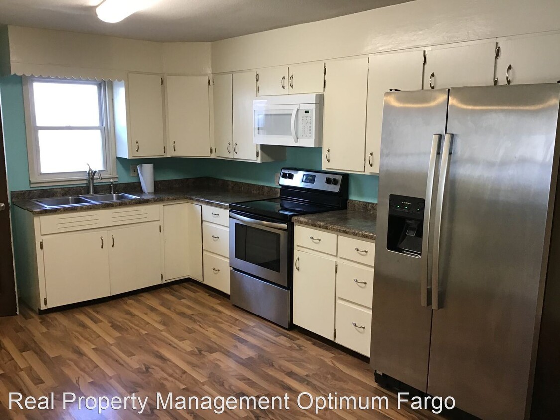 Foto principal - 4 br, 2 bath House - 418 9 1/2 St N