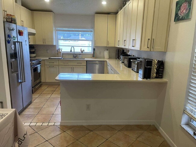 Building Photo - 9727 Cypress Shadow Ave