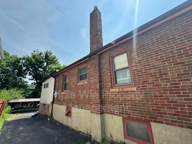 Building Photo - 6905 Woodrow Ave