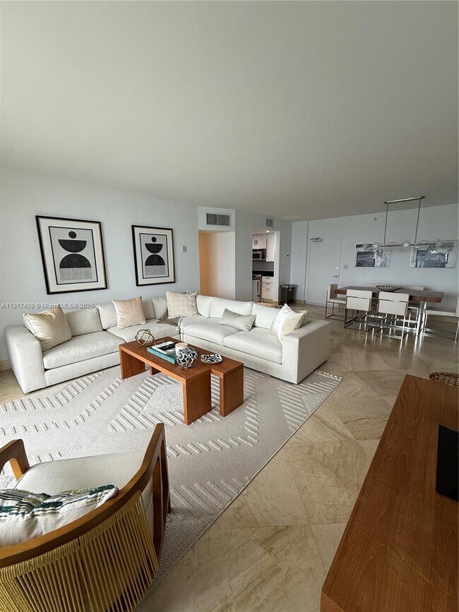 Building Photo - 10275 Collins Ave