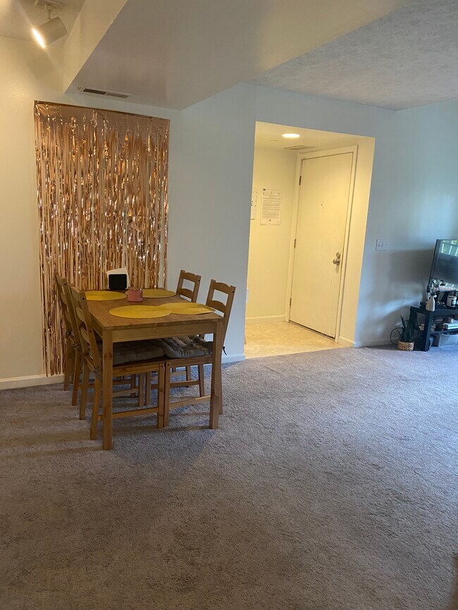 Área de estar de la Unidad D - Sycamore Place