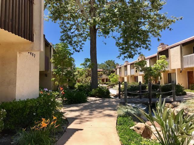 Building Photo - Enjoy the location and layout of this 2 BR, 1.5 BA at Gold Creek Townhomes.