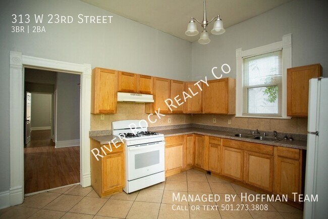 Foto del edificio - 313 W 23rd St