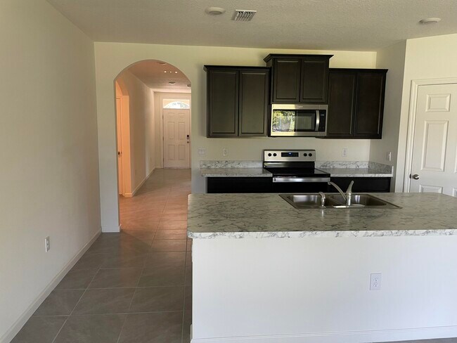 Building Photo - 1771 SW Del Rio Blvd