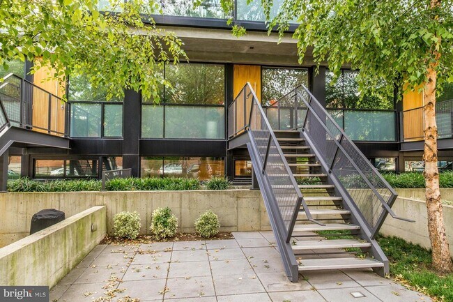 Private street-level entrance and a 400 sq. ft. walled-in patio facing 11th Street NW. - 2250 11th St NW