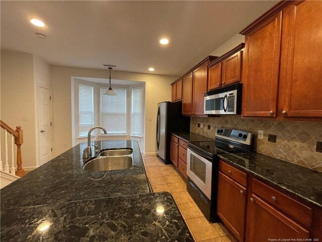 Building Photo - 8803 Camden Park Dr