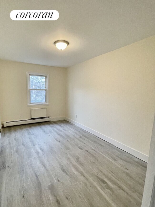 Building Photo - 15-35-35 209th St