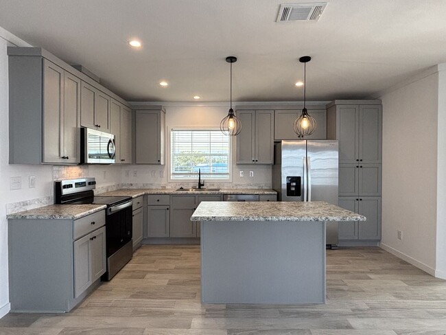 Foto del edificio - 5646 Blue Harbor Dr