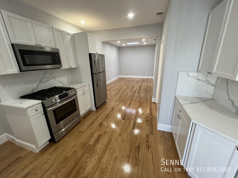 Foto principal - Luxury 2-Bedroom in Porter Square – Modern...