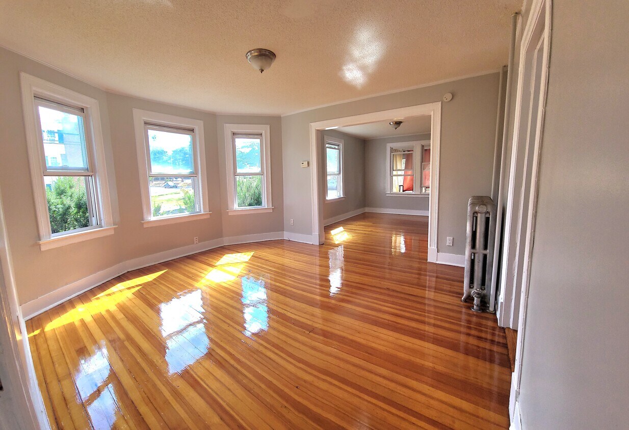 Living room and dinning room - 460 S Quaker Ln
