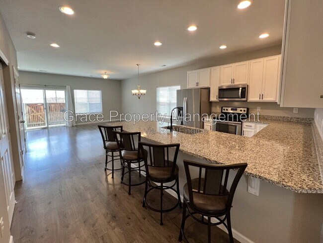 Photo - 14700 East 104th Avenue Townhome