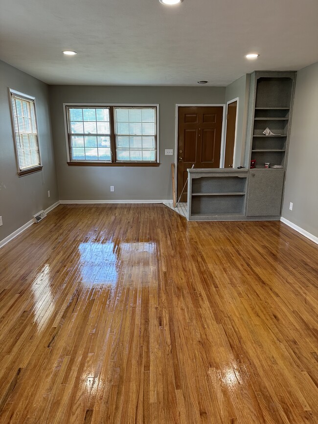 Refinished wood floor in living room - 3035 S 120th St