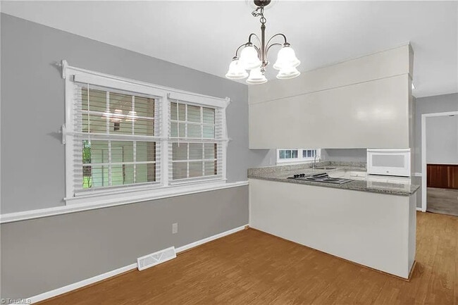 Building Photo - Earn Wealth While Leasing - Like a Homeown...