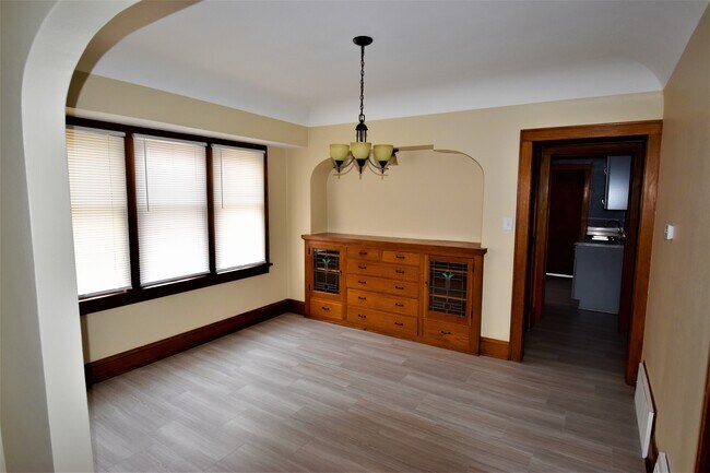 Dining room with vinyl plank flooring - 6203 W Girard Ave