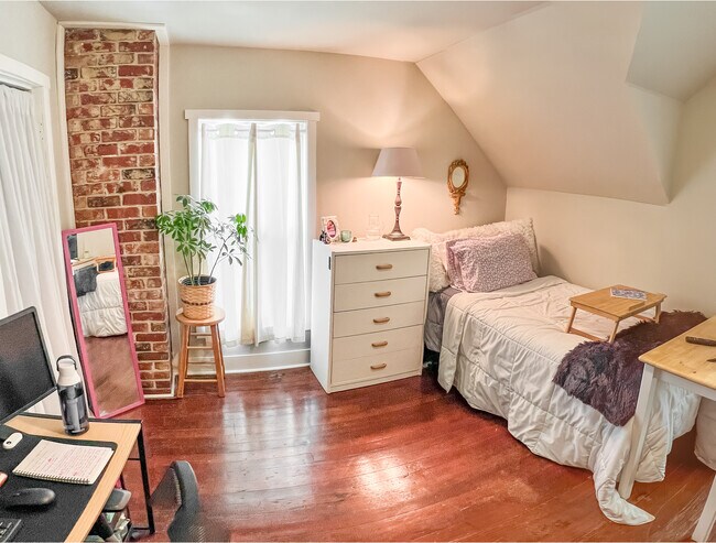4 Large Bedrooms with hard wood floors and brick accents - 205 S Hyland Ave