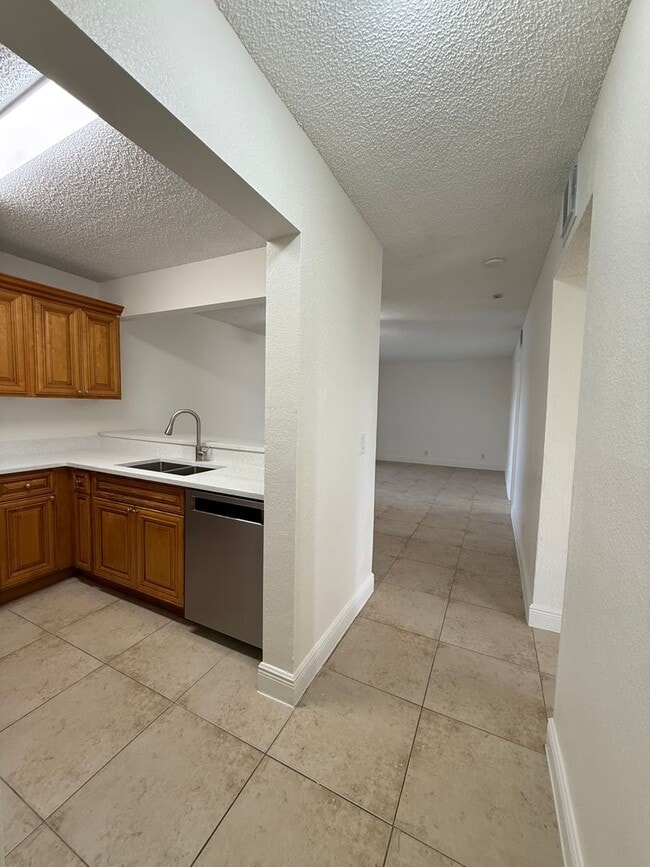 Photo - Updated 2BR/2BA w/ Balcony — Palm Beach Grande Apartment
