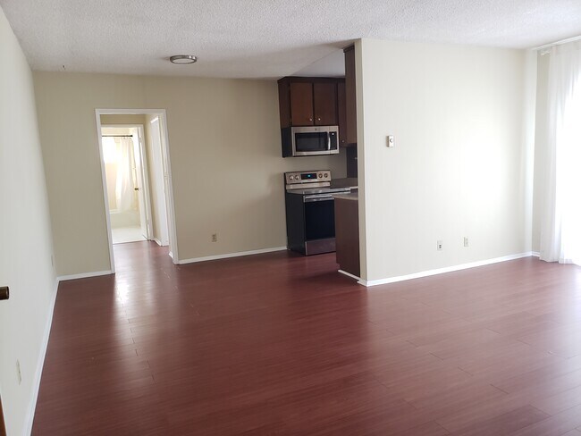 Living room view into apartment interior - 1644 Colby Ave
