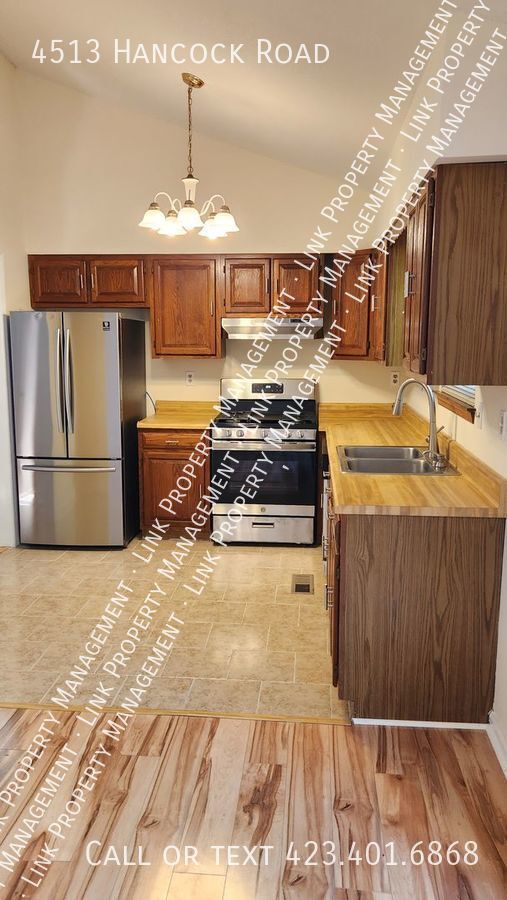 Building Photo - JUST REDUCED!  COMPLETELY Remodeled 3 Bedr...