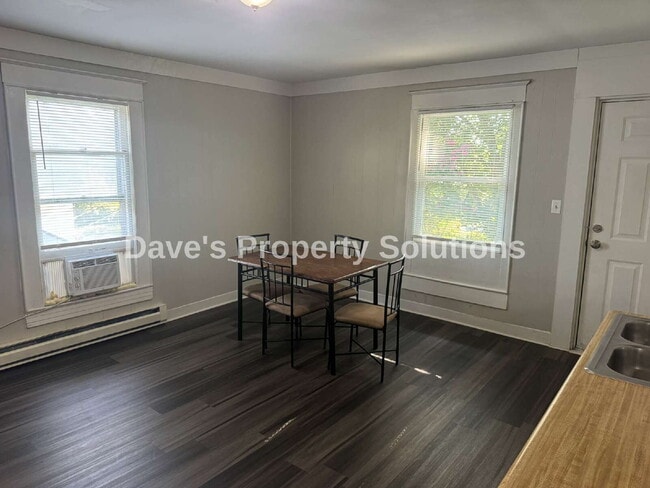 Building Photo - Move-In Ready Upstairs Unit | New Flooring, Eat-In Kitchen & Tons of Closets