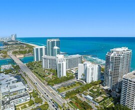 Building Photo - 10275 Collins Ave