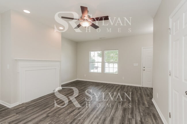 Building Photo - The living is easy in this 3 bedroom, 2.5 bathroom home