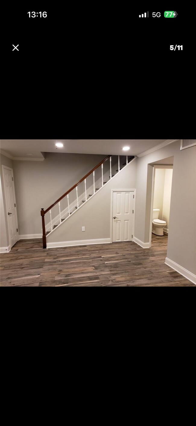 Living area with storage under stairs - 218 Terry Pky