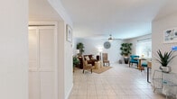 Located at 2711 Allen Rd. in Tallahassee, FL, this single-story 2-bedroom, 1-bathroom home offers a thoughtfully designed layout that maximizes comfort and functionality. Light-toned tile flooring flows consistently throughout the home, creating a clean and cohesive aesthetic.

The combined living and dining area forms the heart of the home, featuring a ceiling fan with integrated lighting and windows that invite natural light. The space is open and versatile, comfortably accommodating both a full living room arrangement and a dedicated dining area.

The kitchen is efficiently designed with white cabinetry, granite-toned countertops, a subway tile backsplash, stainless steel appliances, and a window overlooking the outdoors—providing both functionality and a pleasant workspace.

The spacious primary bedroom offers a generous footprint, natural light from a large window, and the notable convenience of two double closets. The second bedroom is equally well-lit, with a window and ample closet access. Both rooms maintain the home's consistent, neutral color palette.

The full bathroom features white cabinetry, granite-toned countertops, a large vanity mirror, and a shower-tub combination. A dedicated laundry area and six total closets throughout the home round out the practical storage offerings of this well-organized Tallahassee residence.