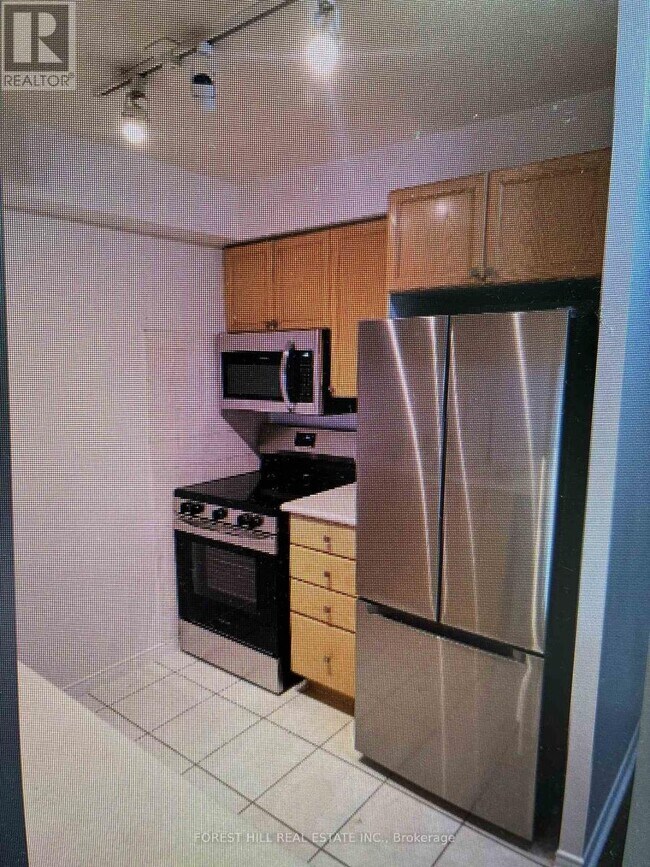 Photo du bâtiment - 909 Bay St.