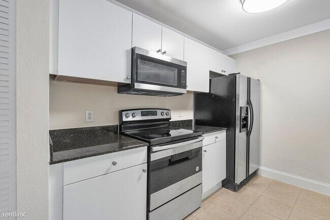 Building Photo - 3 br, 2 bath House - 1760 Palm Cove Blvd #...