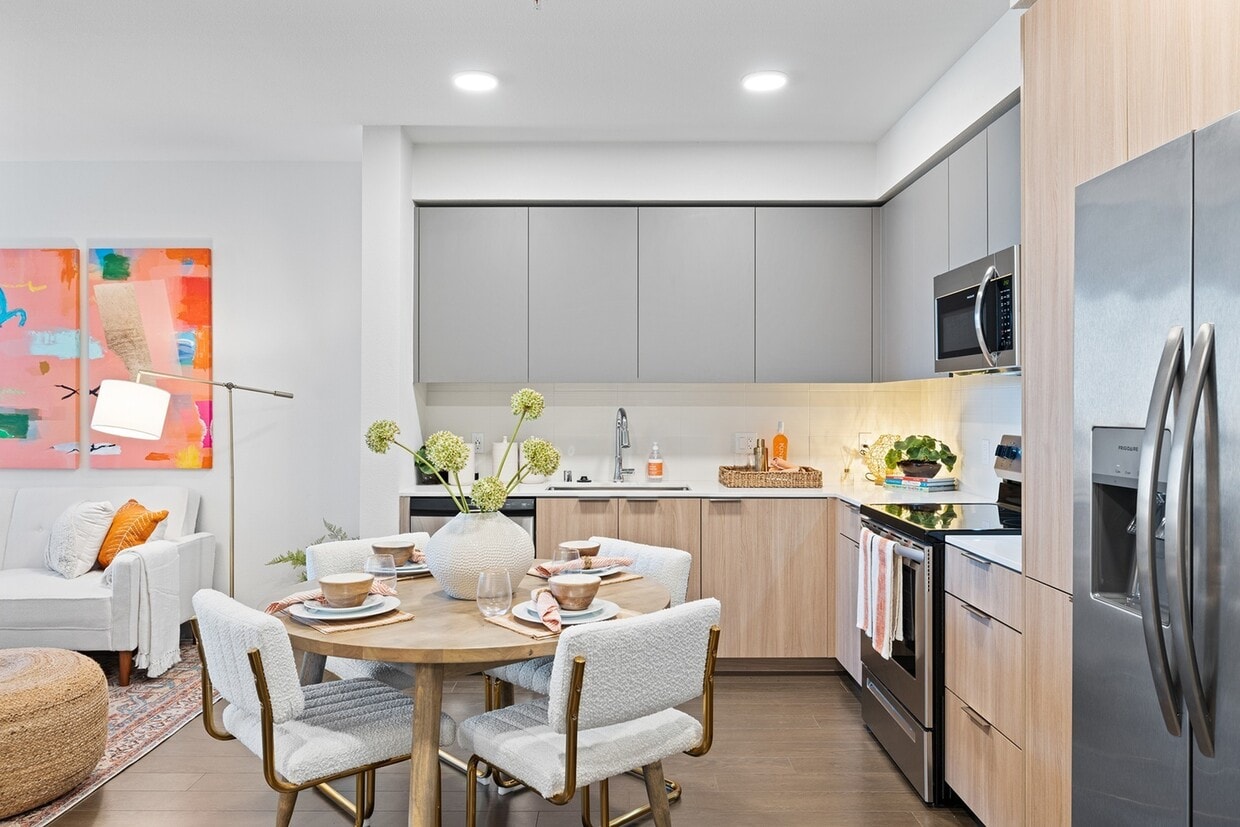 Cook, dine, and unwind in this beautifully designed modern kitchen and dining space, where style meets everyday functionality. - The Grant