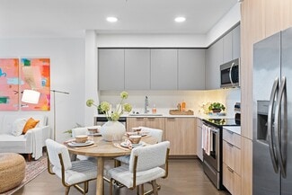 Cook, dine, and unwind in this beautifully designed modern kitchen and dining space, where style meets everyday functionality. - The Grant