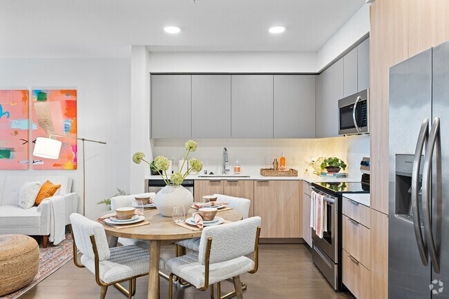 Cook, dine, and unwind in this beautifully designed modern kitchen and dining space, where style meets everyday functionality. - The Grant