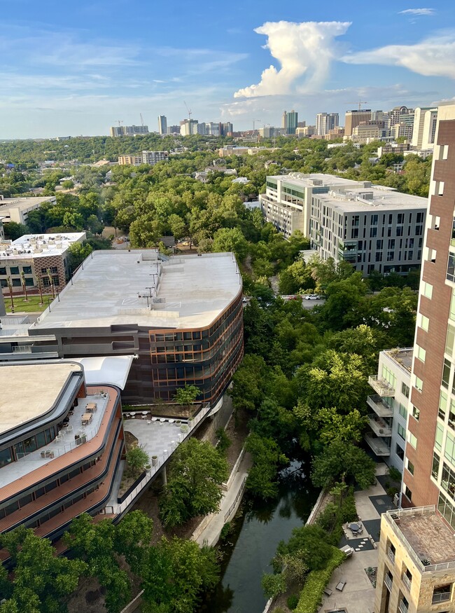 Shoal Creek greenbelt view & UT Tower - 801 W 5th St