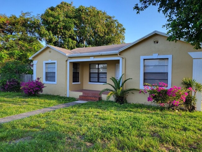 Photo - Renovated 4/2.5 Home with garage and large private backyard