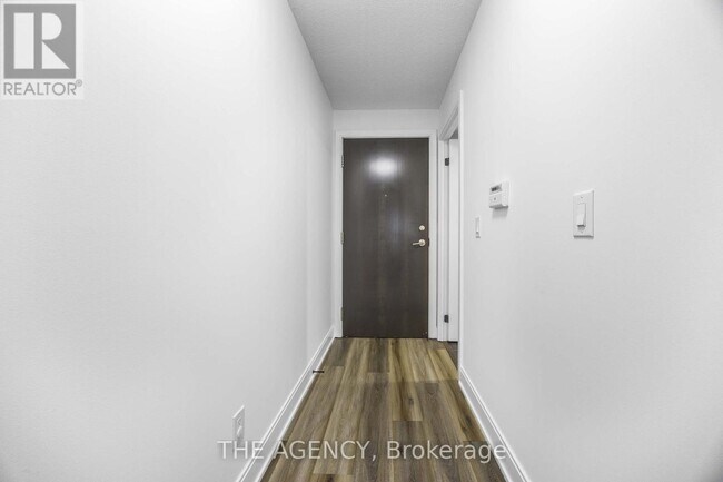 Building Photo - 125-3125 Village Green Square