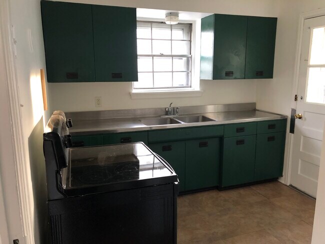 Kitchen with back door - 216 Green Ave