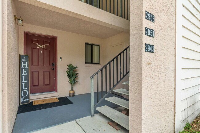 Foto del edificio - Freshly Updated 2BR Condo with Private Balcony, Community Pool, & In-Unit Laundry