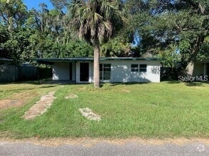 Building Photo - 7341 Royal Palm Dr