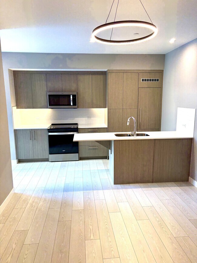 Photo du bâtiment - 310-615 15 Ave SW