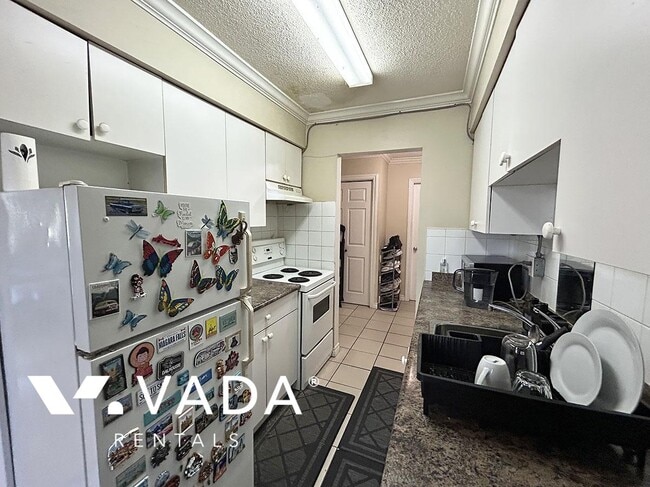 Building Photo - 1 Bedroom Apartment Rental 303-9405 120th ...