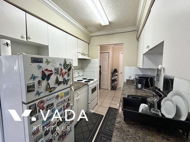 Photo du bâtiment - 2 Bedroom Apartment Rental 301-9405 120th ...